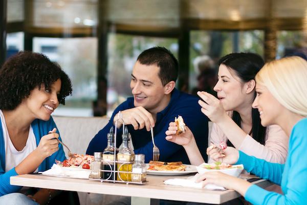 Friends chatting and having lunch