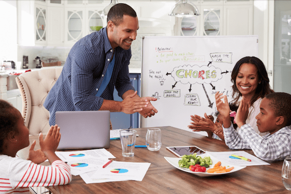 Family meeting at the table to discuss chores