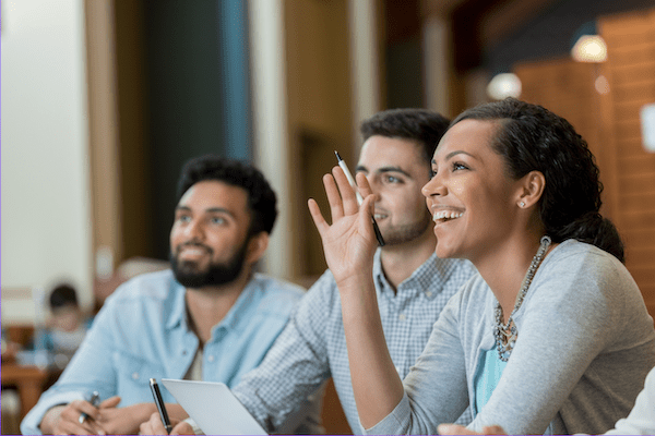 3 people at work looking happy and receptive and awestruck